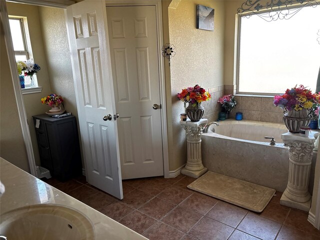 301 Hedy Dr, Killeen, TX 76542 - full bath with a bath, tile patterned flooring, and a healthy amount of sunlight