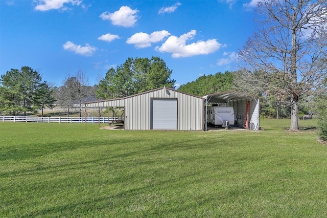 11445 Majestic Dr, Montgomery, TX 77316 - view of outbuilding with an outdoor structure, a detached carport, and fence