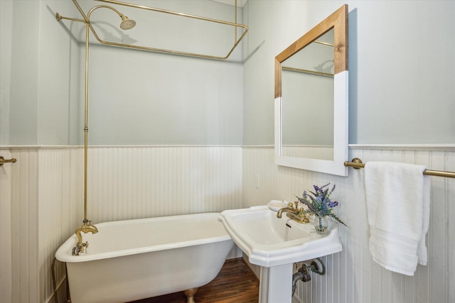 full bath featuring a soaking tub