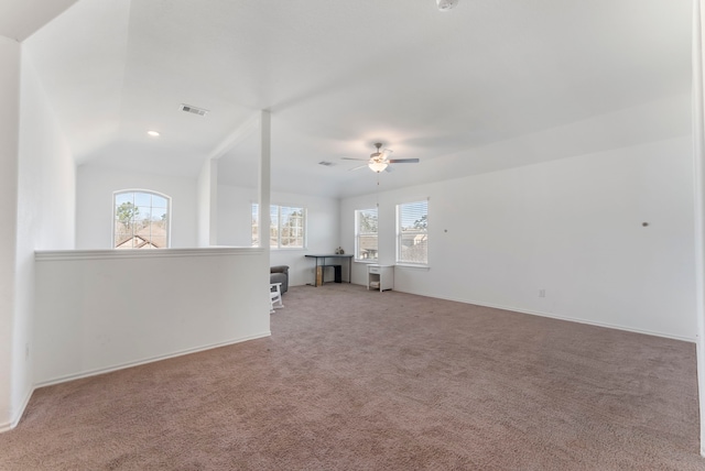 23830 Via Leoni Dr, New Caney, TX 77357 - spare room featuring healthy amount of natural light, a ceiling fan, carpet flooring, and recessed lighting