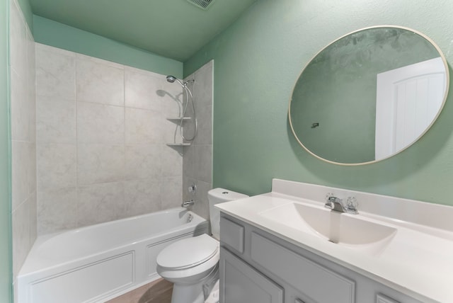 23830 Via Leoni Dr, New Caney, TX 77357 - full bathroom featuring toilet, vanity, and  shower combination