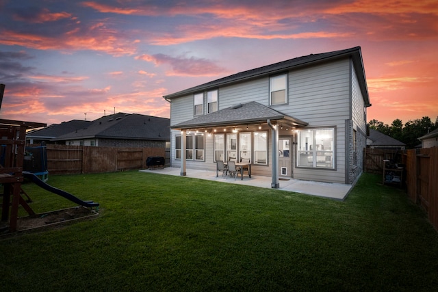 23830 Via Leoni Dr, New Caney, TX 77357 - rear view of house with a patio
