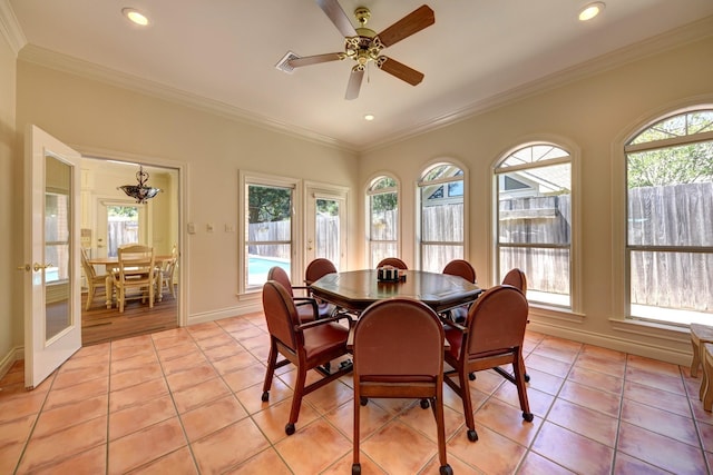 dining space with light tile patterned floors, ornamental molding, and recessed lighting