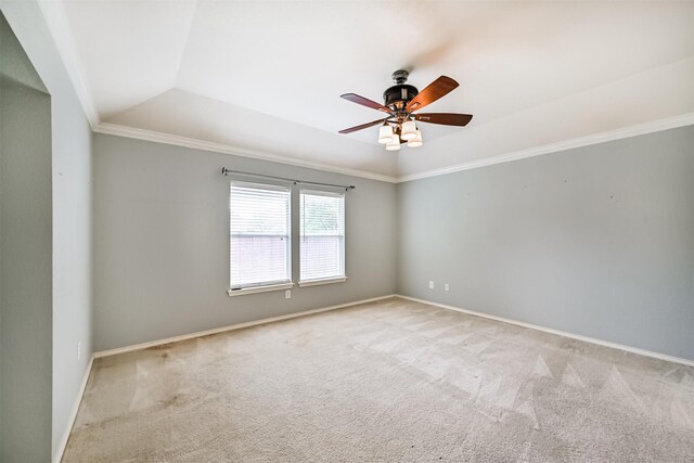 unfurnished room featuring baseboards, a ceiling fan, light colored carpet, and a tray ceiling