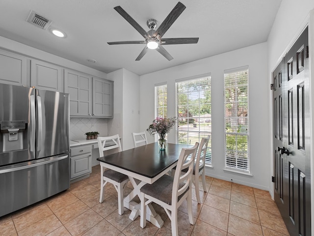 dining space featuring visible vents, baseboards, ceiling fan, recessed lighting, and light tile patterned floors