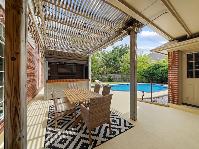 view of patio featuring a fenced in pool, fence, and a pergola