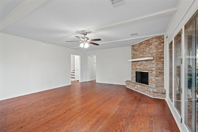 7 Colony Park Cir, Galveston, TX 77551 - unfurnished living room with ceiling fan, a textured ceiling, visible vents, and wood finished floors