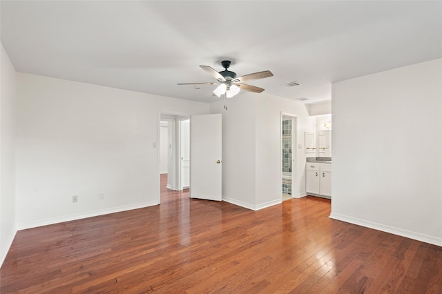 7 Colony Park Cir, Galveston, TX 77551 - unfurnished room with visible vents, a ceiling fan, baseboards, and wood-type flooring