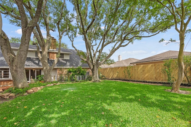 7 Colony Park Cir, Galveston, TX 77551 - view of yard featuring fence