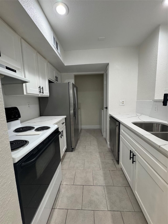kitchen featuring range with electric stovetop, a sink, white cabinetry, light stone countertops, and stainless steel dishwasher