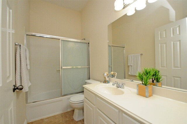 7214 Paradise Park Bnd, Richmond, TX 77407 - full bath featuring toilet, vanity, enclosed tub / shower combo, and tile patterned floors