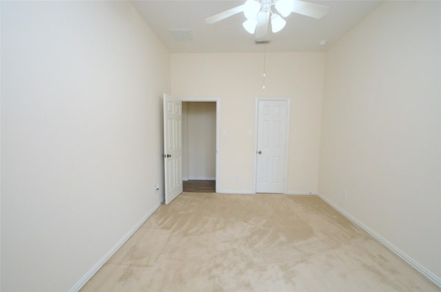 7214 Paradise Park Bnd, Richmond, TX 77407 - spare room featuring visible vents, baseboards, light colored carpet, and ceiling fan