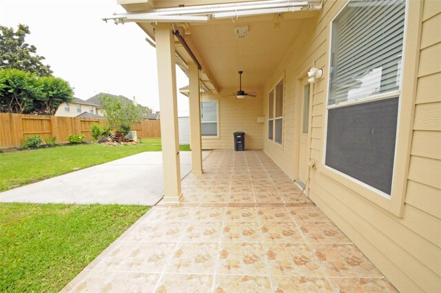 7214 Paradise Park Bnd, Richmond, TX 77407 - view of patio / terrace featuring ceiling fan and a fenced backyard