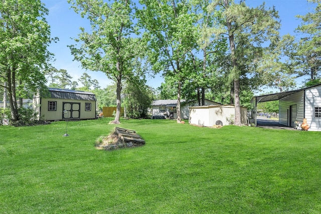 27011 Azalea Ct, Magnolia, TX 77354 - view of yard featuring an outdoor structure and a shed