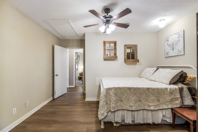27011 Azalea Ct, Magnolia, TX 77354 - bedroom with attic access, ceiling fan, baseboards, and dark wood-type flooring