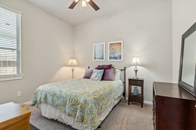 1919 Hickory Grove Ln, Tomball, TX 77375 - bedroom featuring light colored carpet, baseboards, and multiple windows