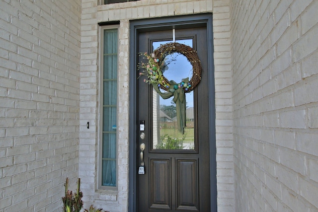 1919 Hickory Grove Ln, Tomball, TX 77375 - property entrance featuring brick siding
