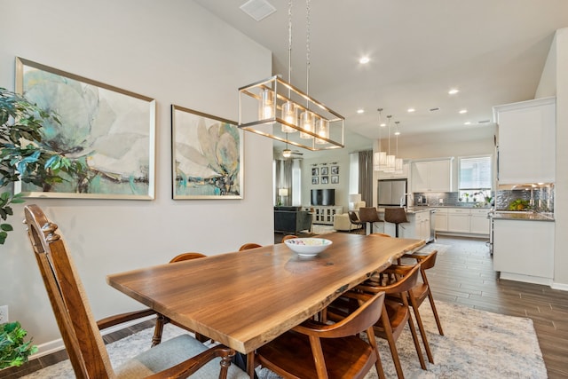 1919 Hickory Grove Ln, Tomball, TX 77375 - dining space with an inviting chandelier, dark wood-style floors, visible vents, and recessed lighting