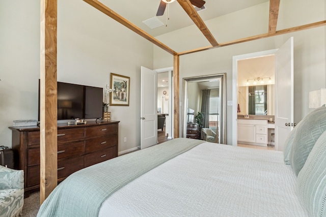 1919 Hickory Grove Ln, Tomball, TX 77375 - bedroom featuring a ceiling fan, vaulted ceiling, and connected bathroom