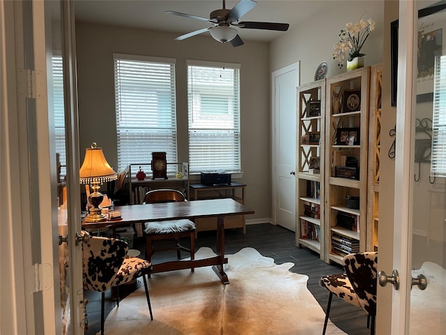1919 Hickory Grove Ln, Tomball, TX 77375 - home office with wood finished floors, a ceiling fan, and baseboards