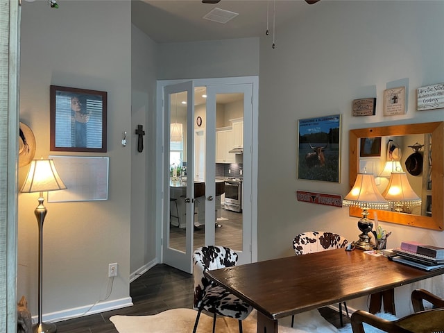 1919 Hickory Grove Ln, Tomball, TX 77375 - dining room featuring french doors, visible vents, baseboards, a ceiling fan, and dark wood-type flooring