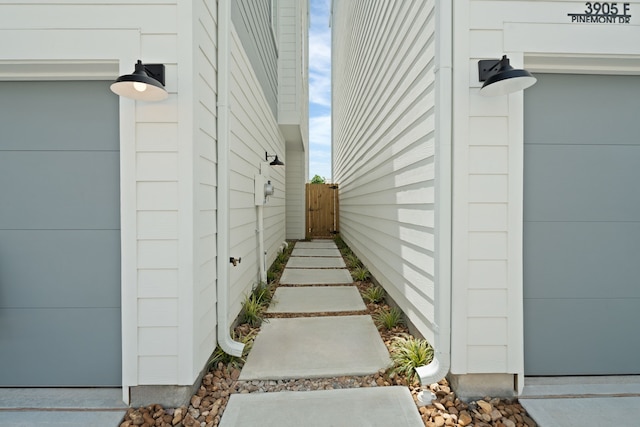 view of home's exterior featuring fence