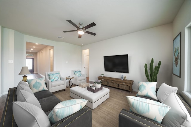 1934 32nd Ave N, Texas City, TX 77590 - living area featuring visible vents, baseboards, a ceiling fan, and wood finished floors