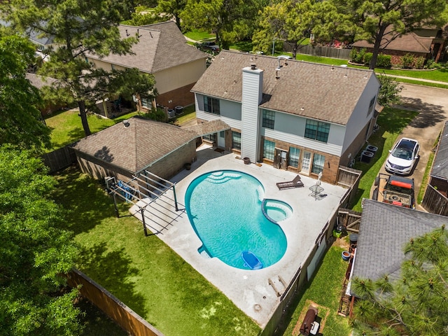 17203 Meadow Heights Dr, Houston, TX 77095 - view of swimming pool featuring a yard, a fenced backyard, a fenced in pool, and a patio