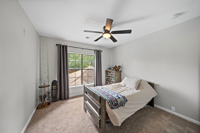 17203 Meadow Heights Dr, Houston, TX 77095 - carpeted bedroom with baseboards, a ceiling fan, and visible vents