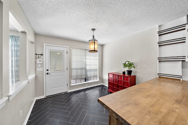 17203 Meadow Heights Dr, Houston, TX 77095 - interior space featuring a textured ceiling and baseboards