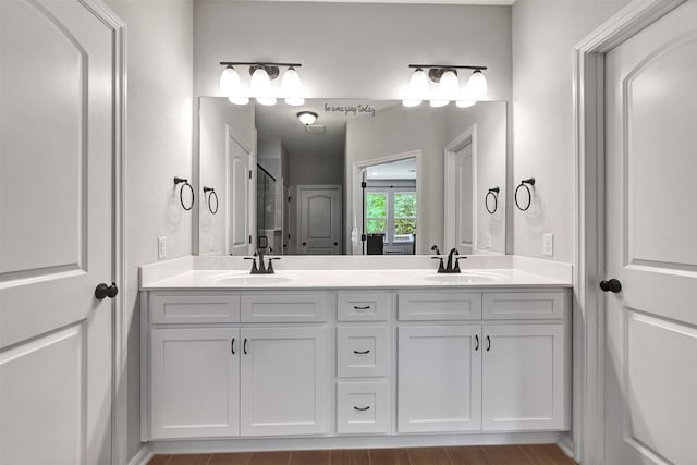 30000 Round Up Dr, Waller, TX 77484 - bathroom featuring a sink, a shower stall, and double vanity