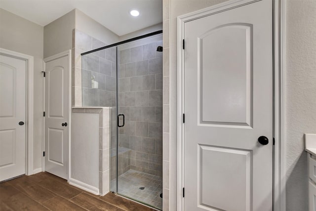 30000 Round Up Dr, Waller, TX 77484 - bathroom featuring a shower stall, vanity, and wood finished floors