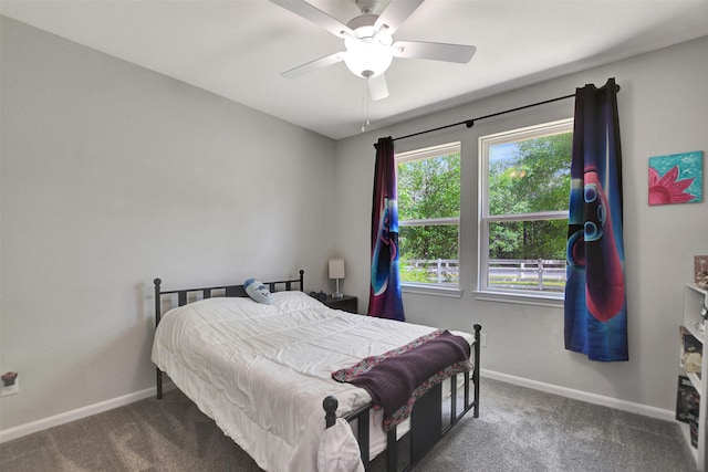 30000 Round Up Dr, Waller, TX 77484 - carpeted bedroom with ceiling fan and baseboards