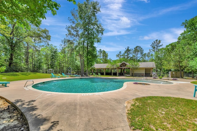30000 Round Up Dr, Waller, TX 77484 - pool featuring a yard, a patio area, and fence