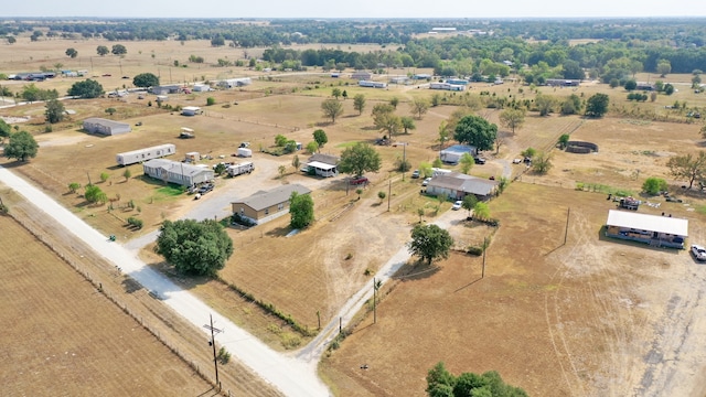 birds eye view of property featuring a rural view