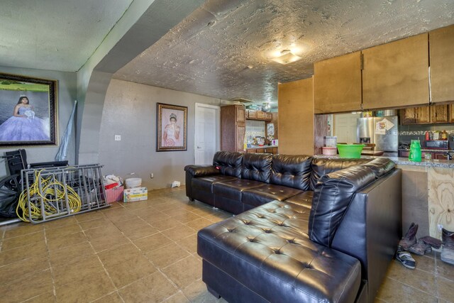 living area with light tile patterned flooring