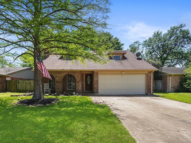 22403 Red River Dr, Katy, TX 77450 - traditional home with a garage, driveway, a front lawn, and brick siding
