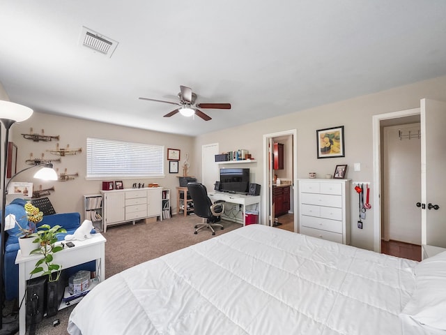 22403 Red River Dr, Katy, TX 77450 - bedroom with visible vents, ceiling fan, carpet flooring, and ensuite bath