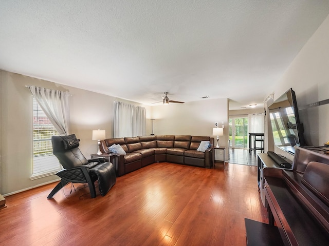 22403 Red River Dr, Katy, TX 77450 - living area with wood finished floors and ceiling fan