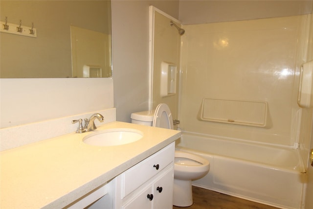 full bathroom featuring toilet, vanity, and shower / tub combination