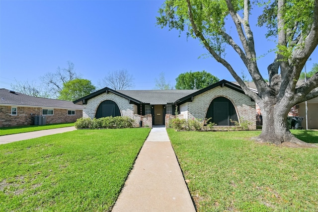 154 Camellia St, Sugar Land, TX 77478 - single story home with brick siding, central AC unit, and a front lawn