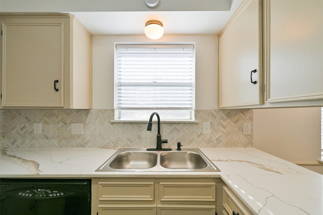 154 Camellia St, Sugar Land, TX 77478 - kitchen featuring a sink, black dishwasher, backsplash, and cream cabinetry