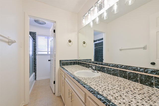 154 Camellia St, Sugar Land, TX 77478 - full bathroom featuring vanity, tile patterned flooring, and bath / shower combo with glass door
