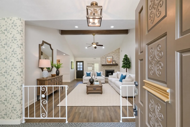 154 Camellia St, Sugar Land, TX 77478 - living room featuring wood finished floors, baseboards, a ceiling fan, a brick fireplace, and recessed lighting