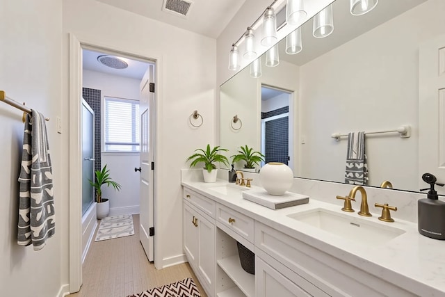 154 Camellia St, Sugar Land, TX 77478 - full bath with double vanity and baseboards