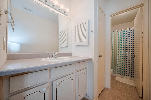 5711 Sugar Hill Dr Unit 34, Houston, TX 77057 - bathroom with tile patterned flooring, vanity, toilet, and curtained shower
