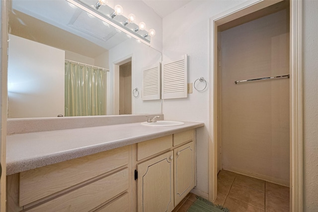 5711 Sugar Hill Dr Unit 34, Houston, TX 77057 - full bath featuring vanity and tile patterned floors