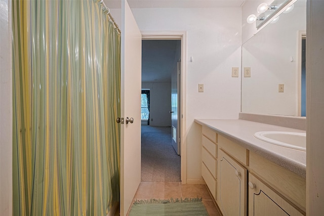 5711 Sugar Hill Dr Unit 34, Houston, TX 77057 - full bathroom with vanity, tile patterned floors, and a shower with curtain