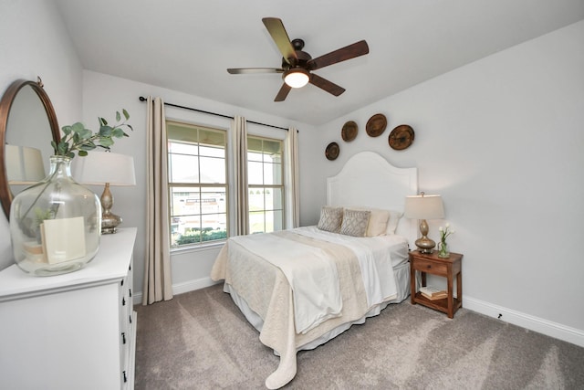 19407 Sorrel Stallion Trl, Tomball, TX 77377 - carpeted bedroom with baseboards and a ceiling fan