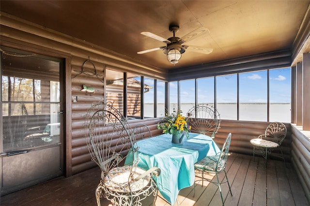 221 Kokomo Run, Point Blank, TX 77364 - sunroom with log walls and hardwood / wood-style floors